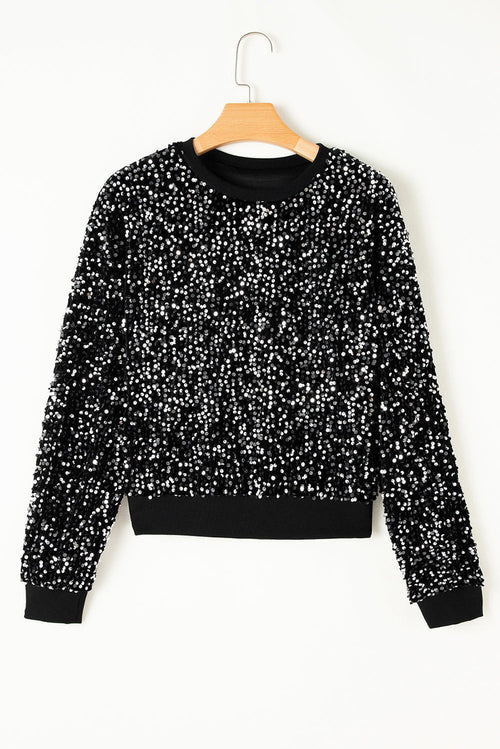 Chloe - Blusa corta de manga larga con lentejuelas negras.